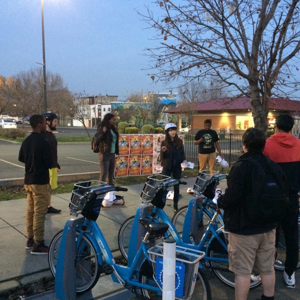 Bicycle Coalition staff member Pati Gutiérrez speaks to the students about being safe on the road.