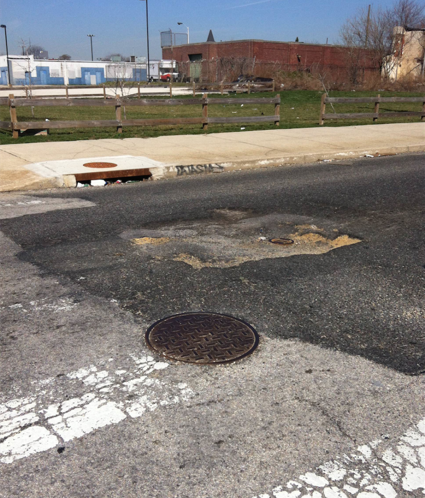 A dangerous pothole on 27th Street, which could present an obstacle for Wright's Bike to School Day.