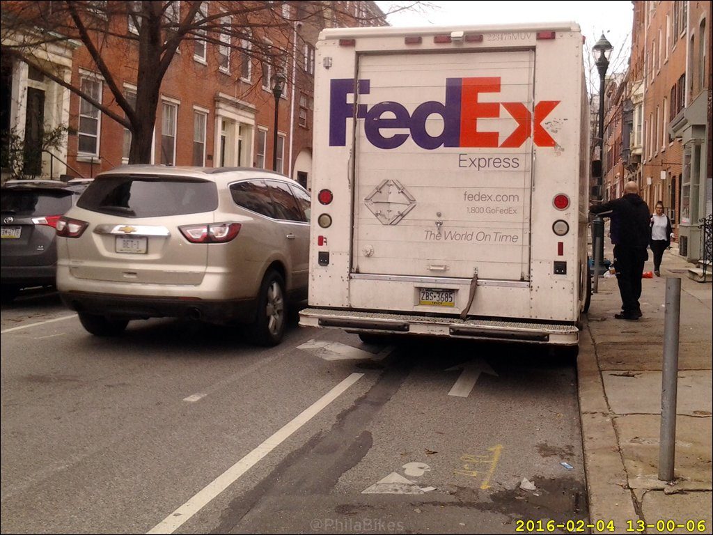 FedEx truck blocking bike lane. Image via Twitter user @PhilaBikes
