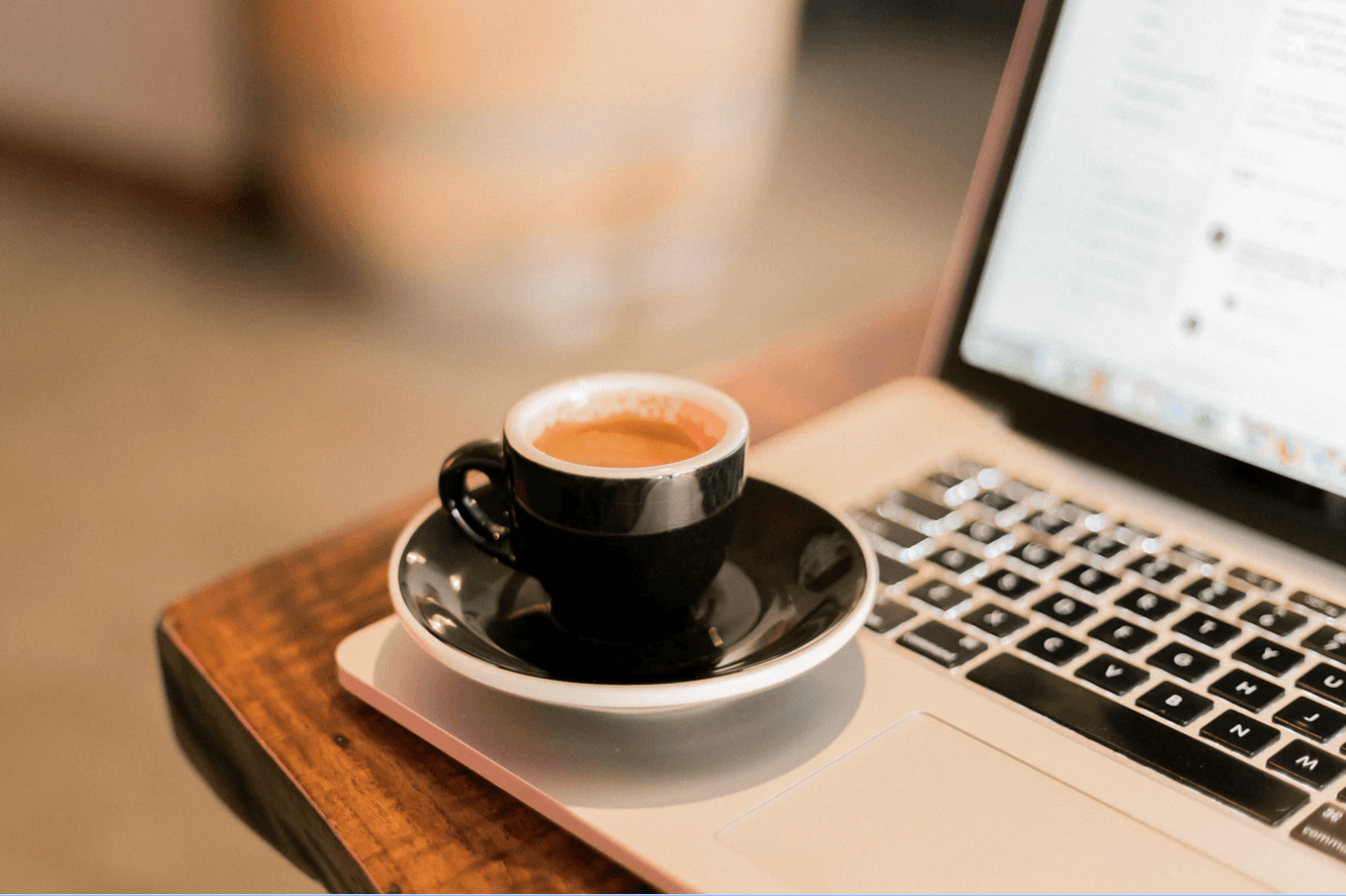 Coffee sitting on laptop